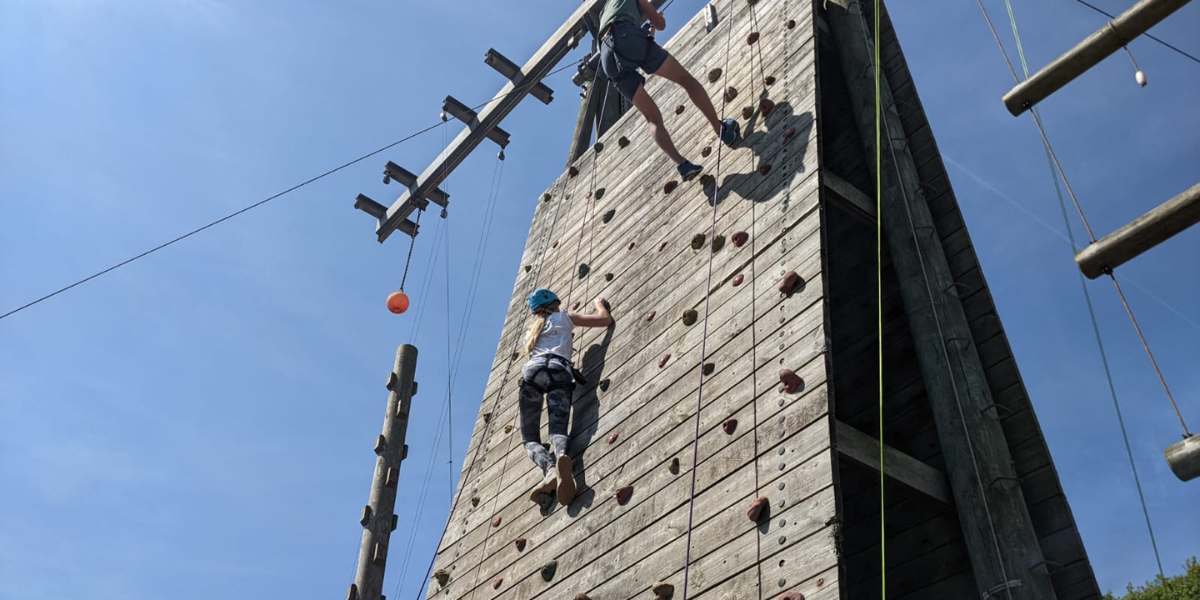 Child climbing the climbing wall