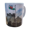 St Donat's Castle mug with photograph of portcullis with Welsh flag flying