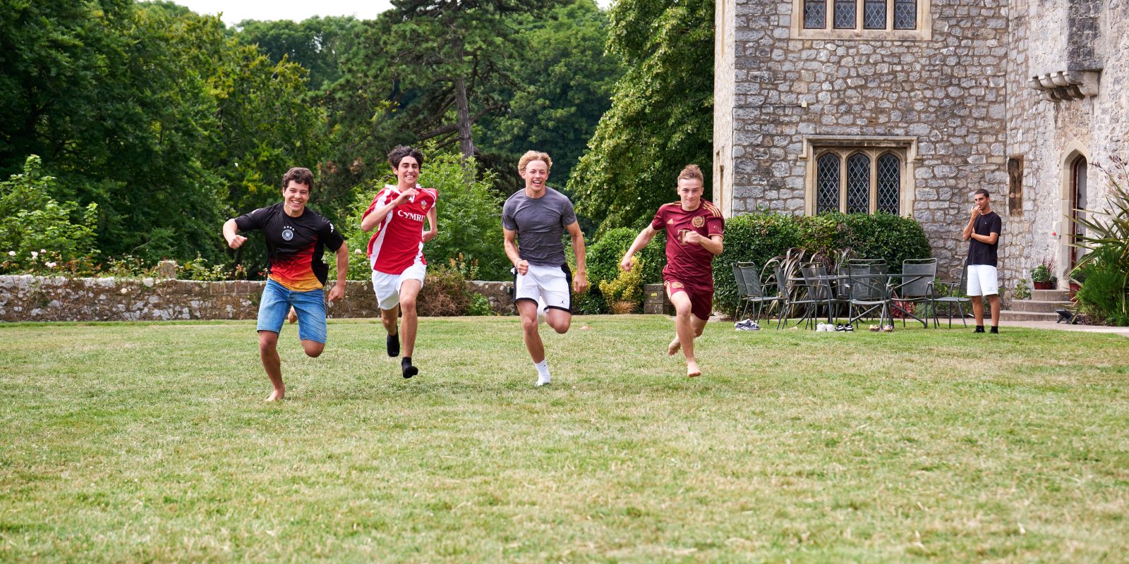 Boys running as part of sports in the ELEA programme