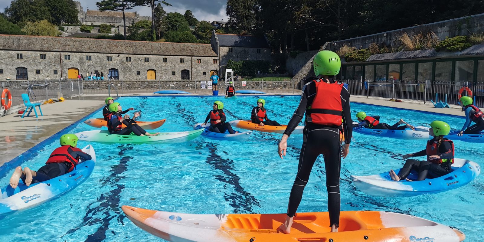 ELEA participant kayaking in the pool