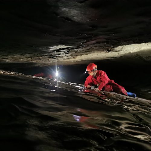 child caving underground
