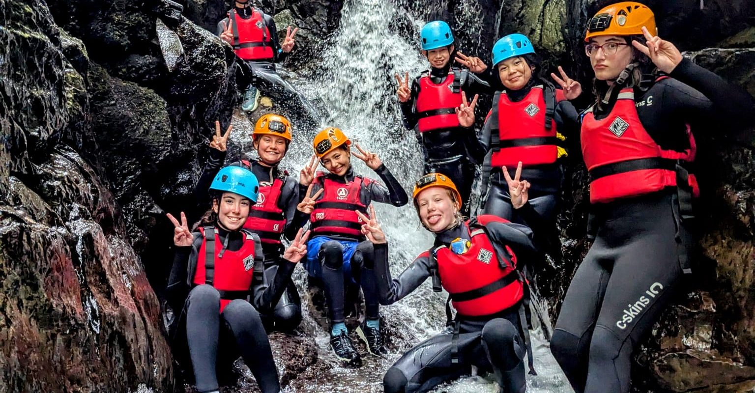 Young students taking part in gorgewalking activity