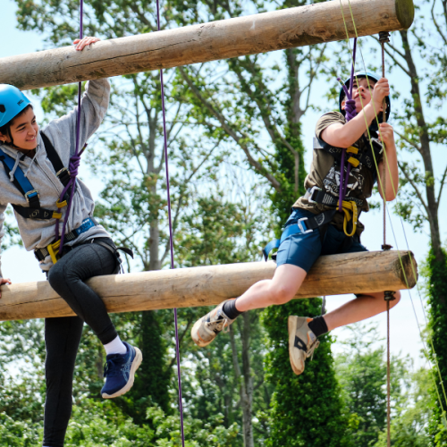 kids on climbing ropes